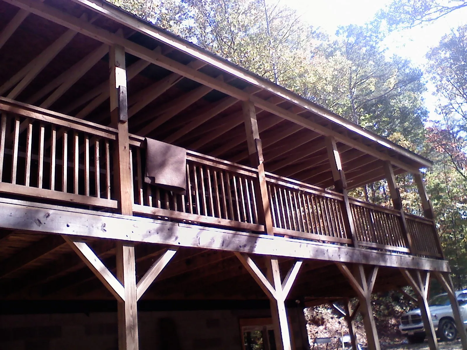 Timber framing under a new elevated porch and deck — Roof Leak Repair in Dalmatia by Roofing Brothers